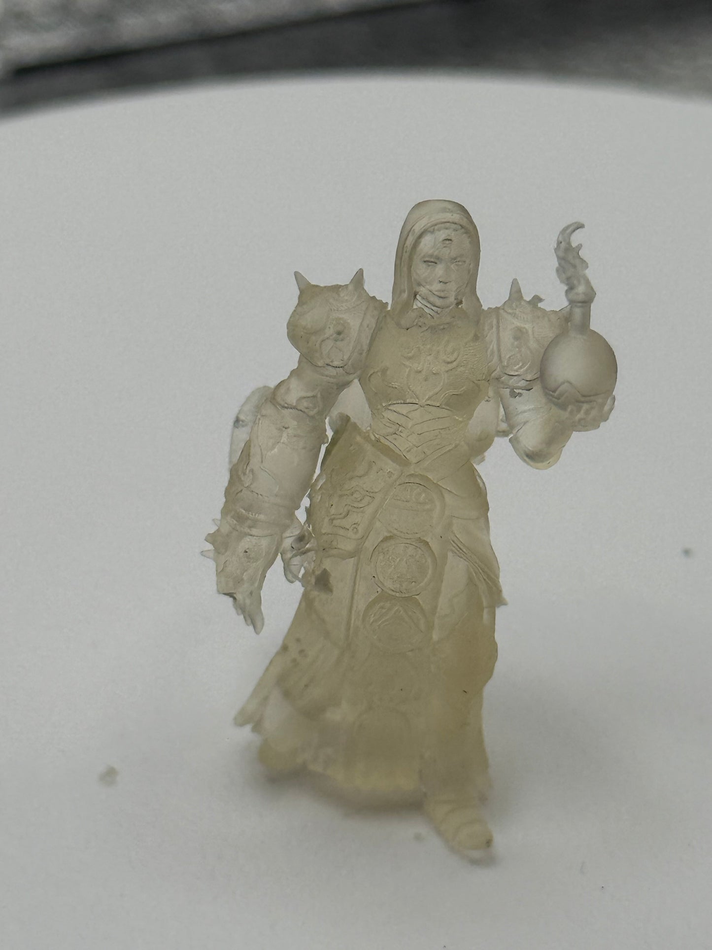 Clear resin armored cleric miniature