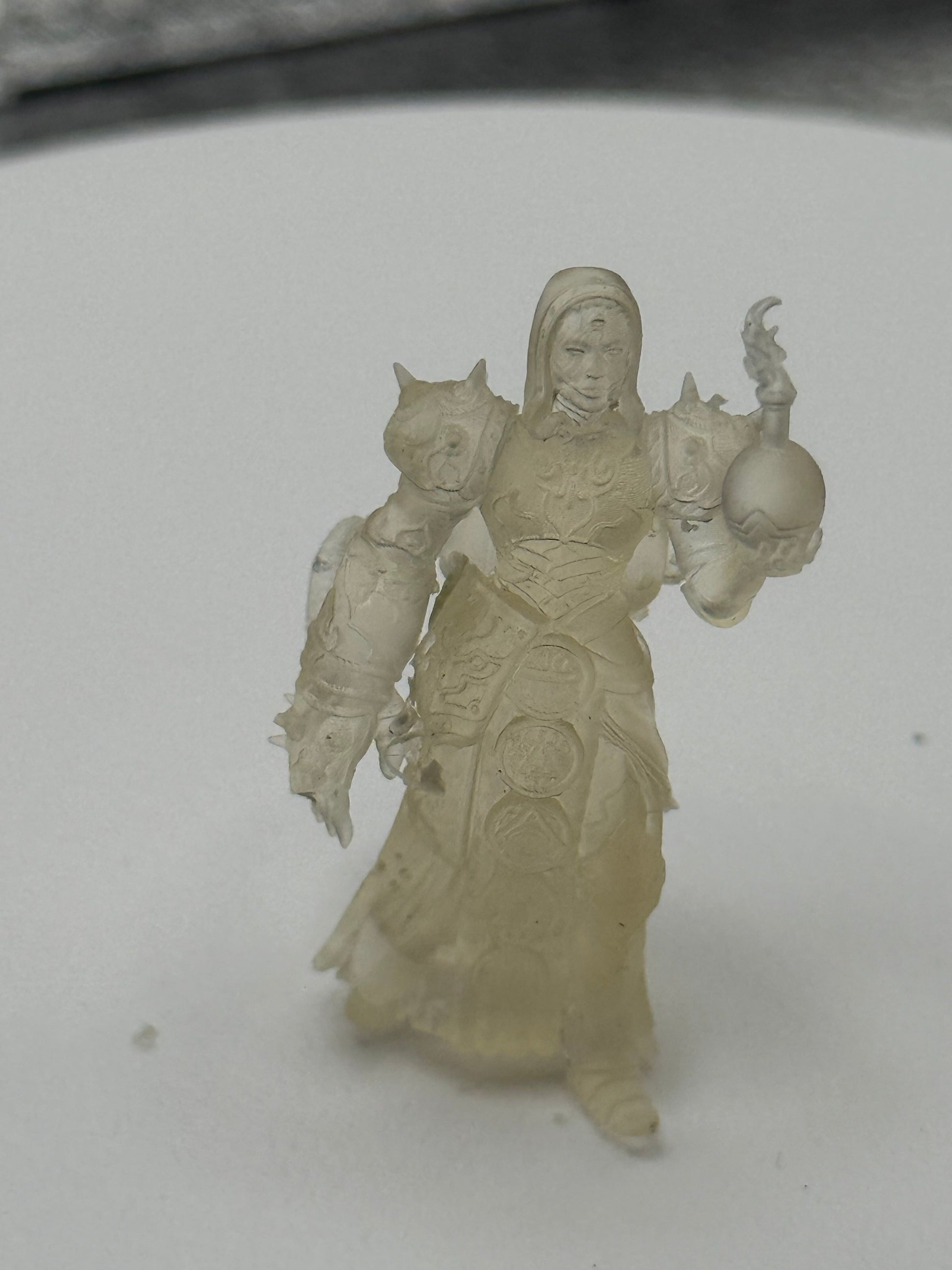 Clear resin armored cleric miniature